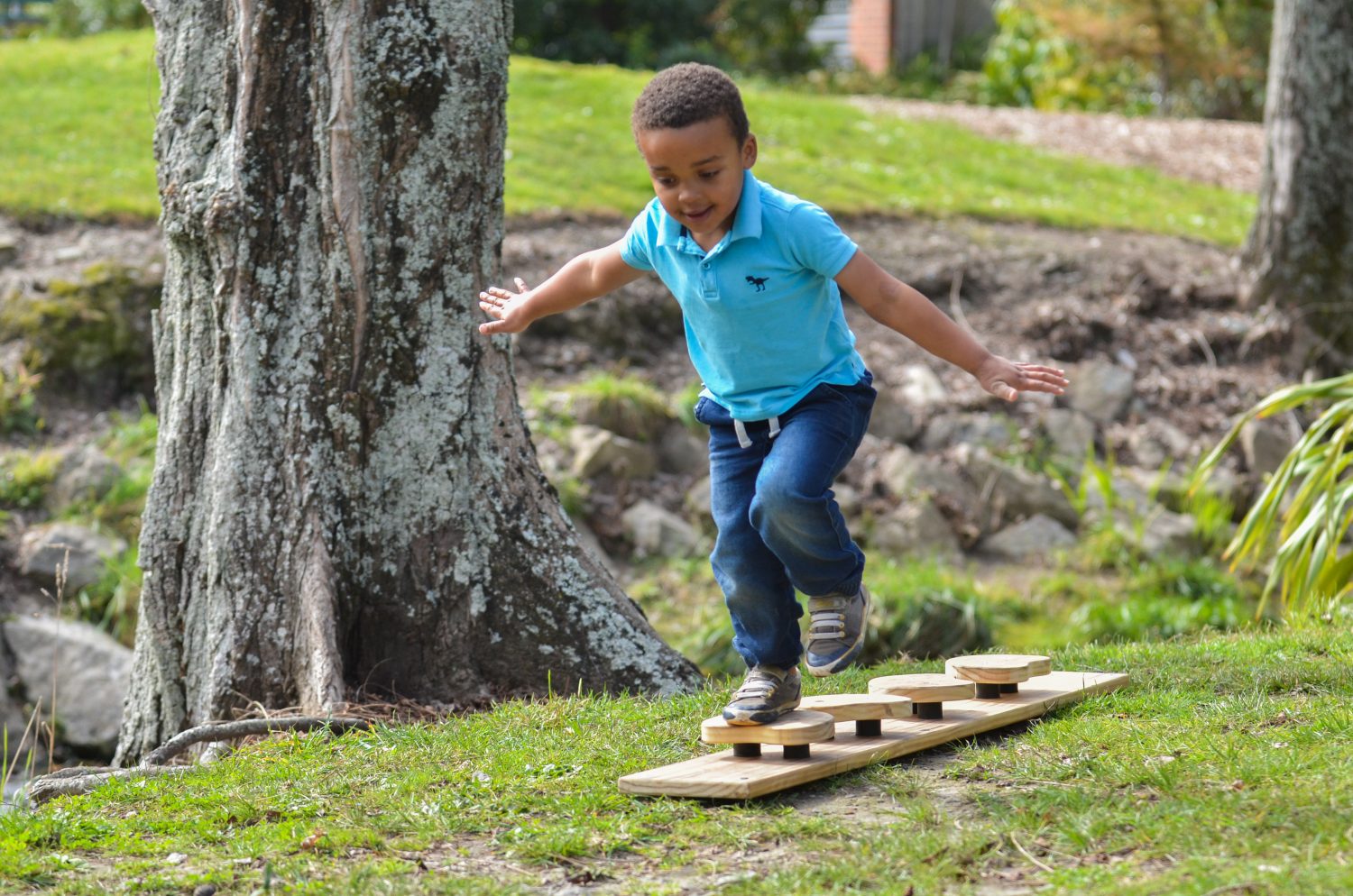 Child playing safely on Outdorable equipment